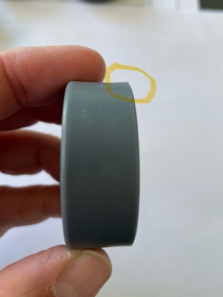 TPR wheel tread edge with a marked raised area